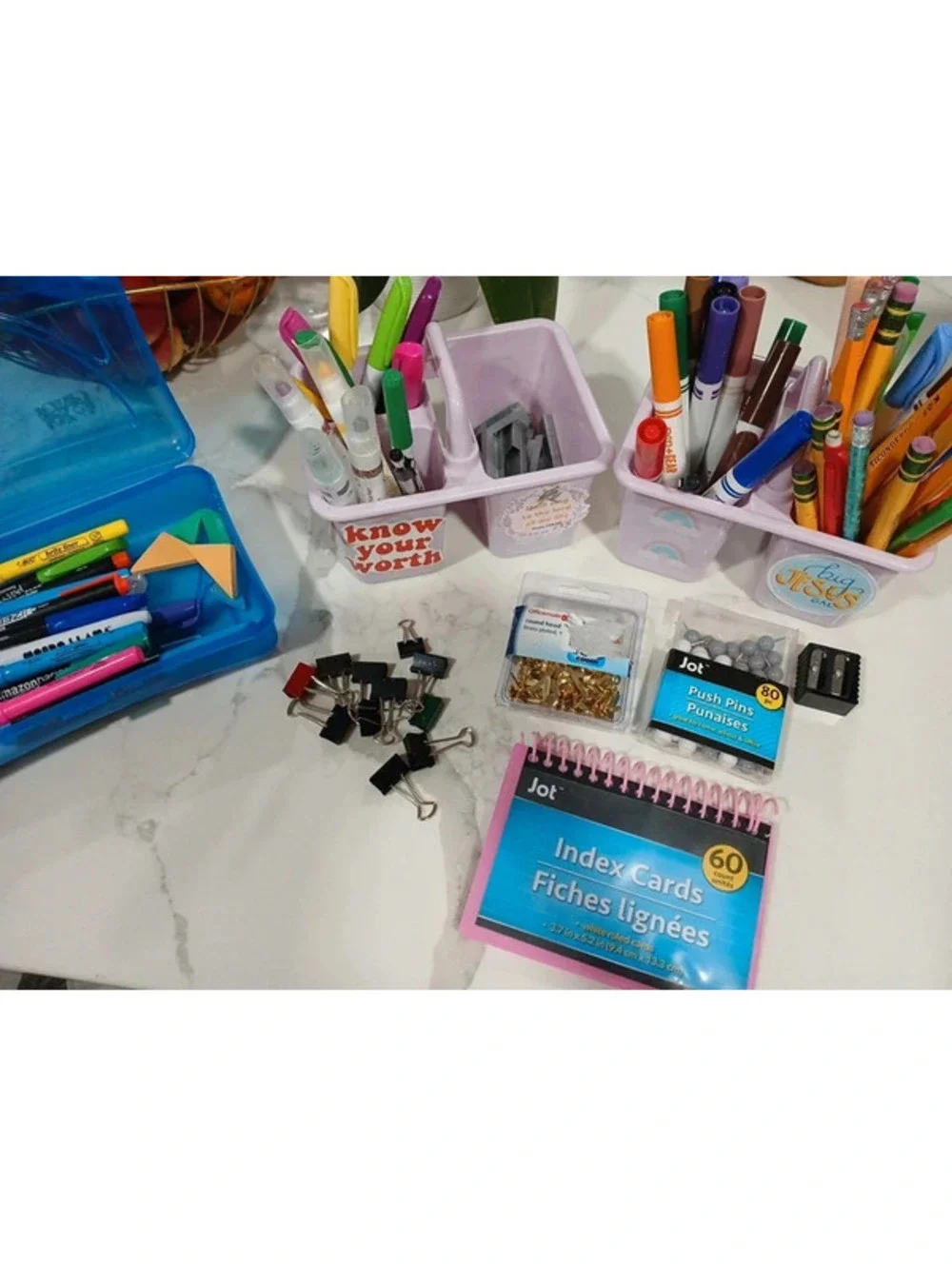 School supplies pencils markers pens pins